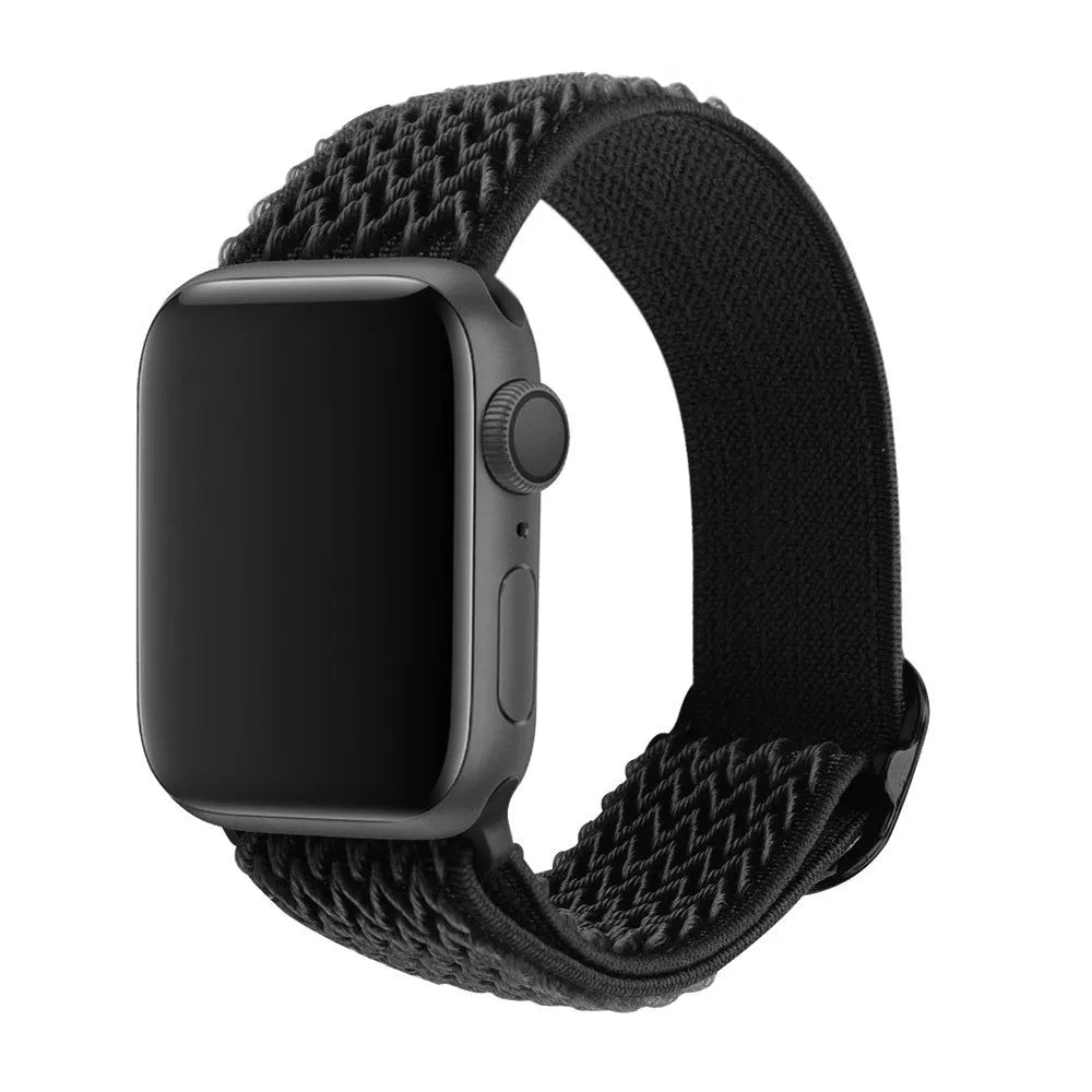 Braided elastic nylon Apple Watch strap in multiple colours on a grey background.