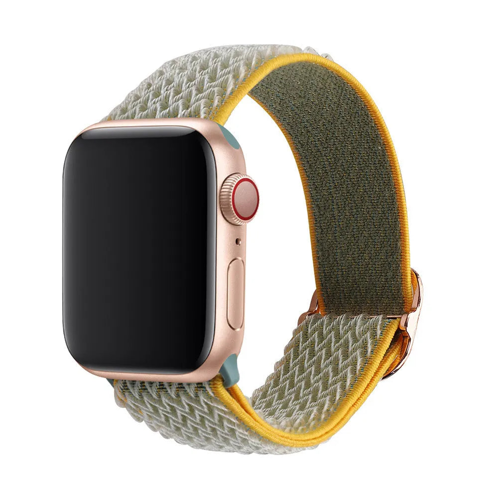 Braided elastic nylon Apple Watch strap in multiple colours on a grey background.
