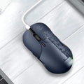 Blue rechargeable wireless smart mouse with voice control and translation functions on a desk.