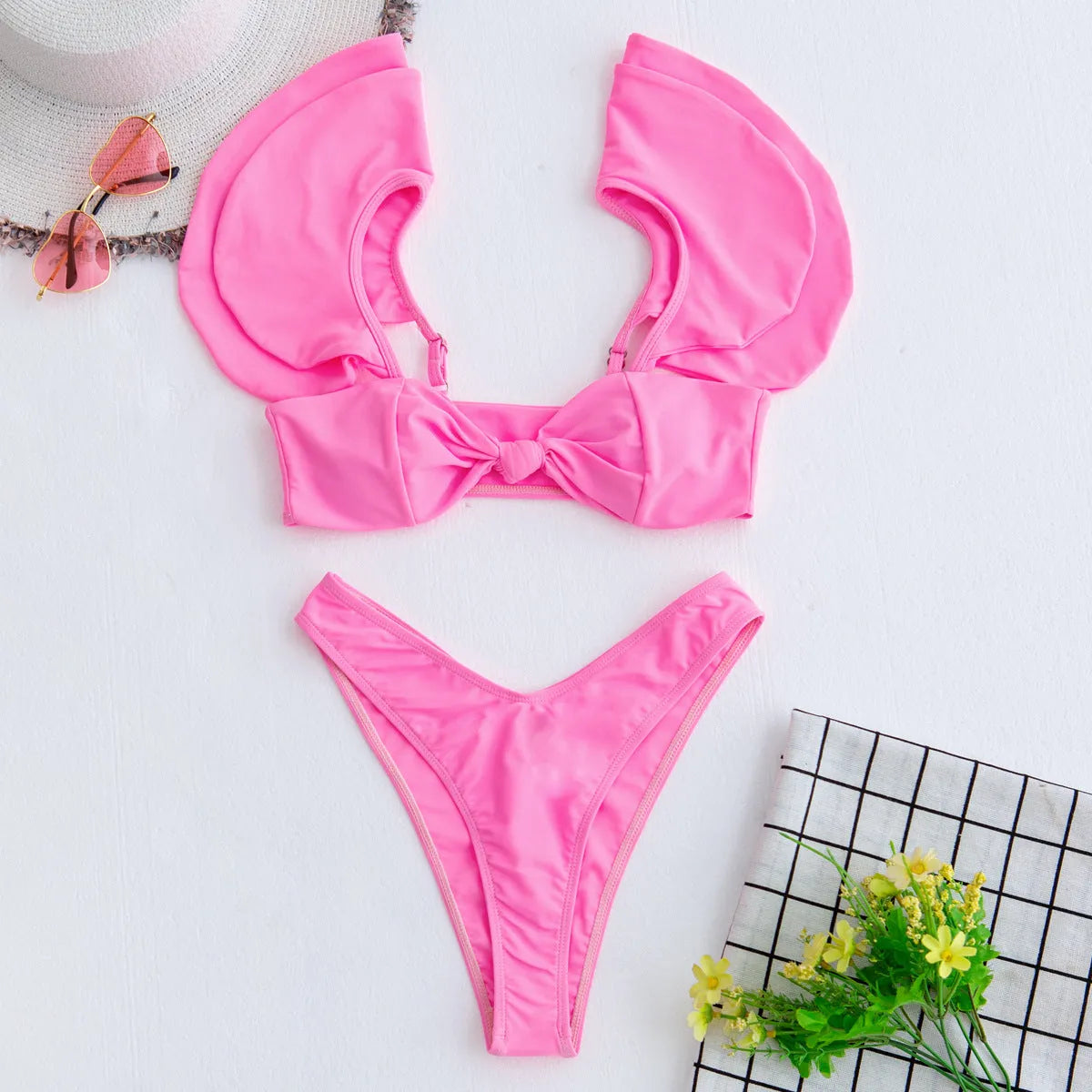 Pink women's 2 piece nylon bikini set with ruffle top and chest pads, available in S M L sizes