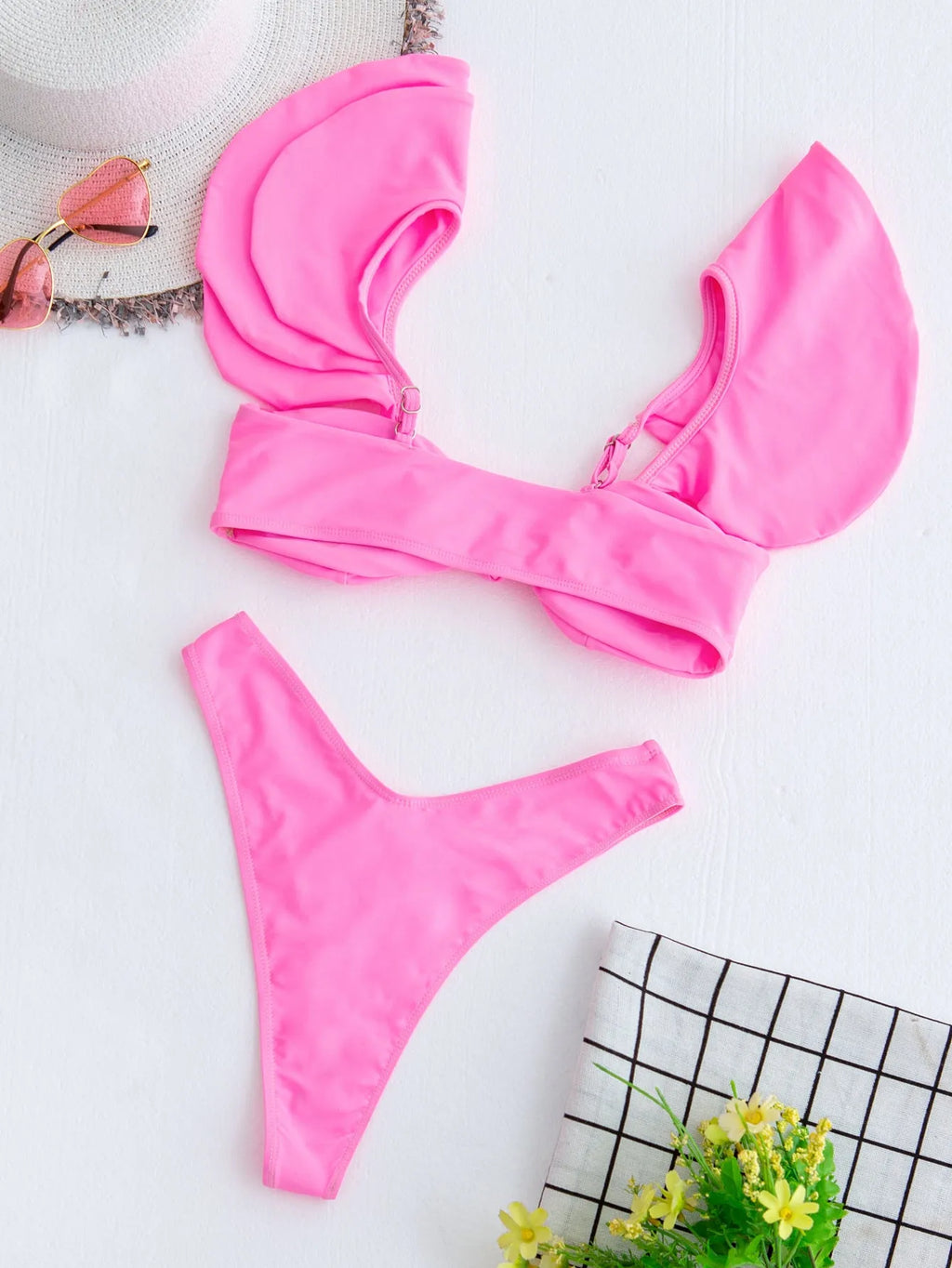 Pink women's 2 piece nylon bikini set with ruffle top and chest pads, available in S M L sizes