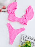 Pink women's 2 piece nylon bikini set with ruffle top and chest pads, available in S M L sizes