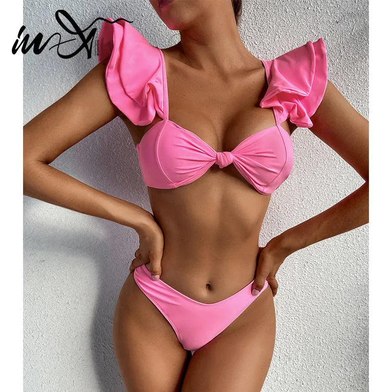 Pink women's 2 piece nylon bikini set with ruffle top and chest pads, available in S M L sizes