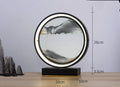 Small decorative glass table lamp with a simple modern design on a bedside table, showing a colourful mountain pattern