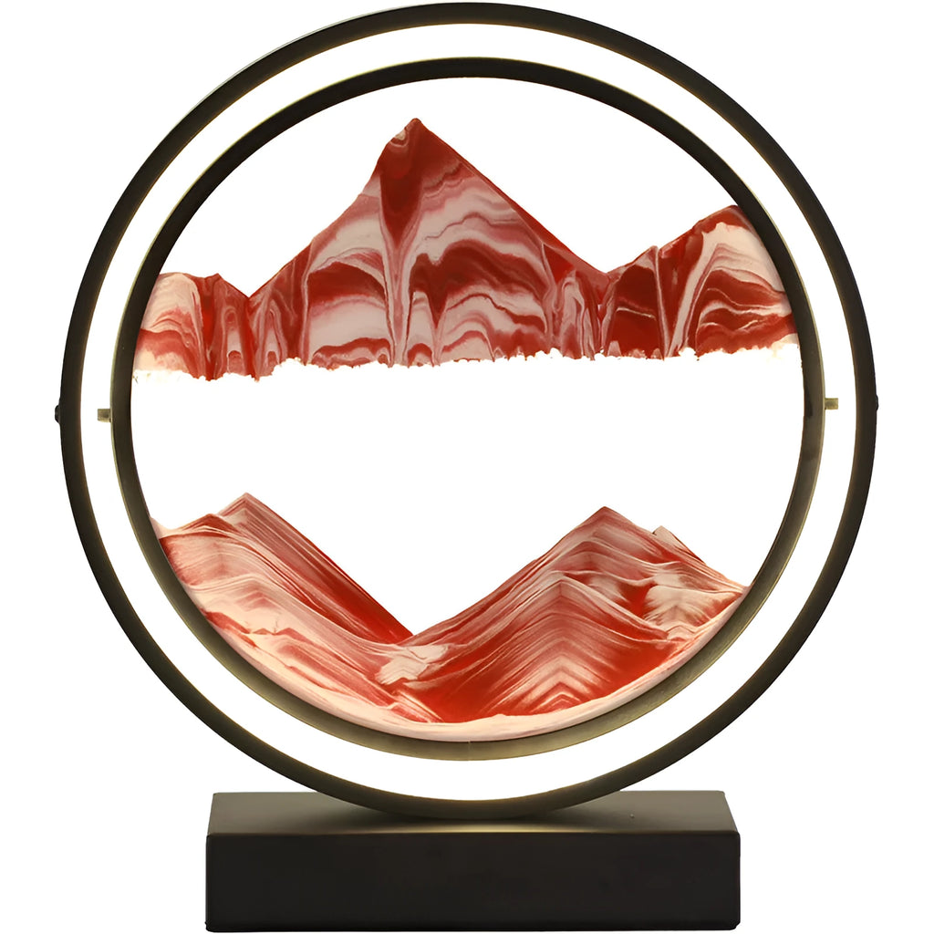 Small decorative glass table lamp with a simple modern design on a bedside table, showing a colourful mountain pattern
