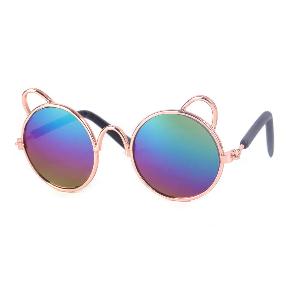 Cat wearing metal frame sunglasses in black with reflective lenses