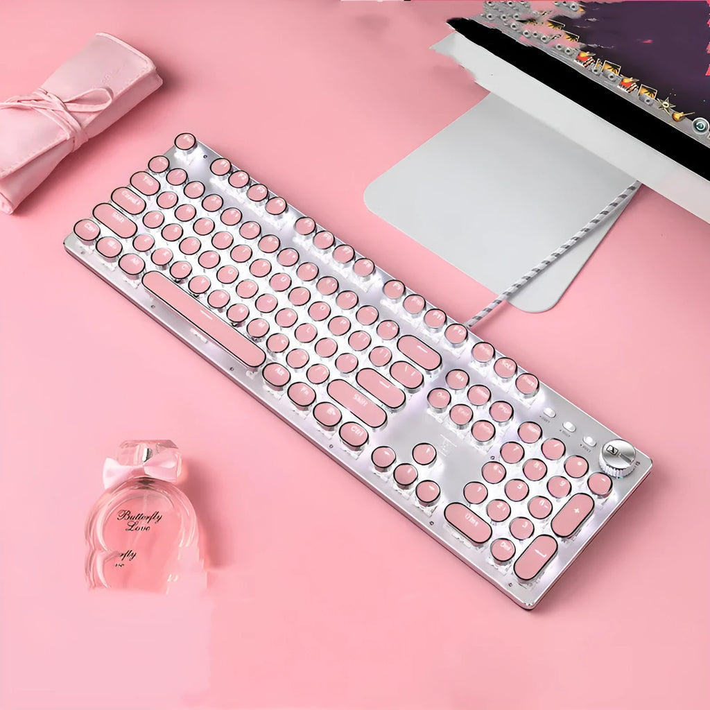 Technology Xinmeng Queen Lipstick mechanical keyboard with green switches, silver base, and pink keycaps
