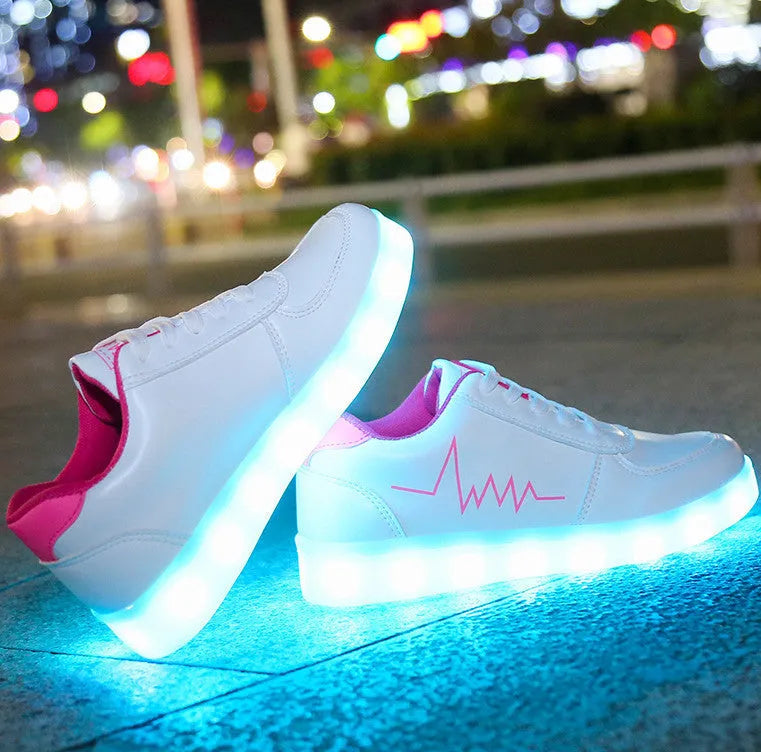 Women's USB-charging LED luminous shoes in gold with low-top lace-up design and round toe on a white background