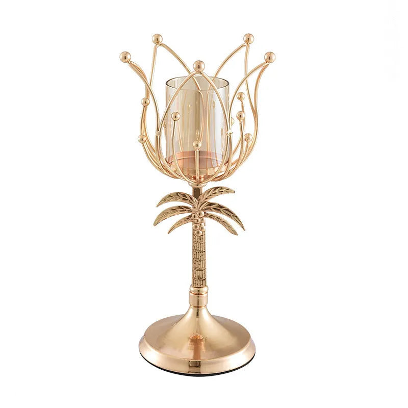Gold iron candle holder on a dining table with a lit candle, three height options available