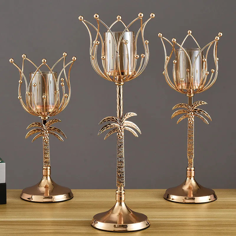 Gold iron candle holder on a dining table with a lit candle, three height options available