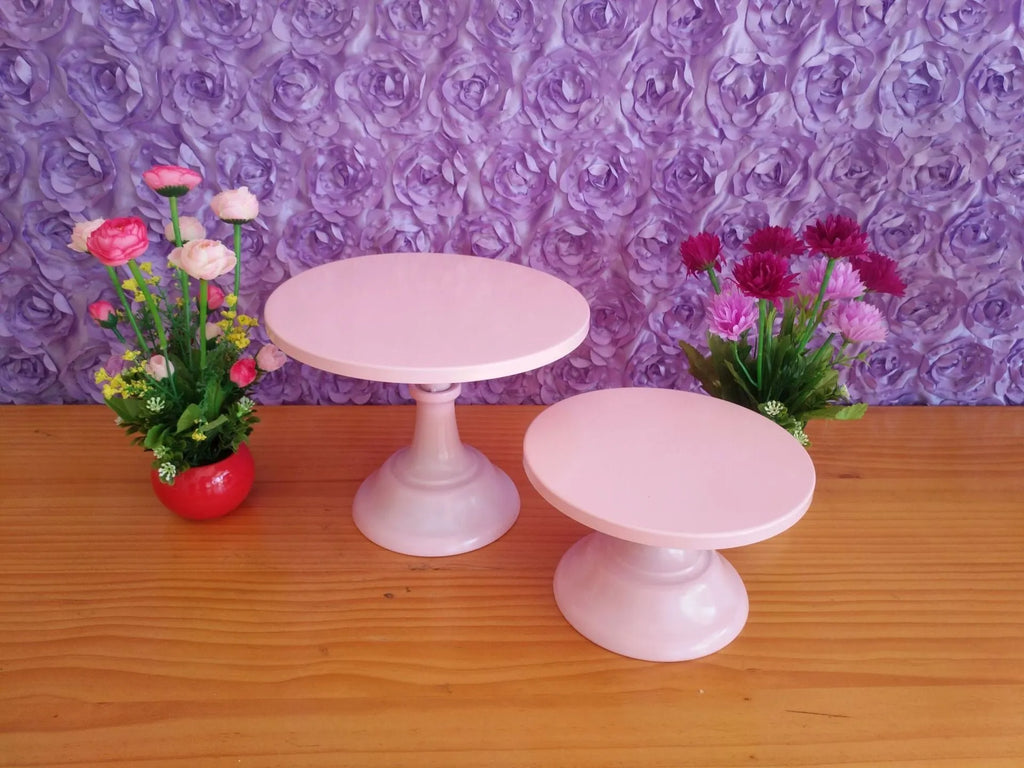 Tiered 10-inch dessert tray in chosen colour on a table with cakes displayed