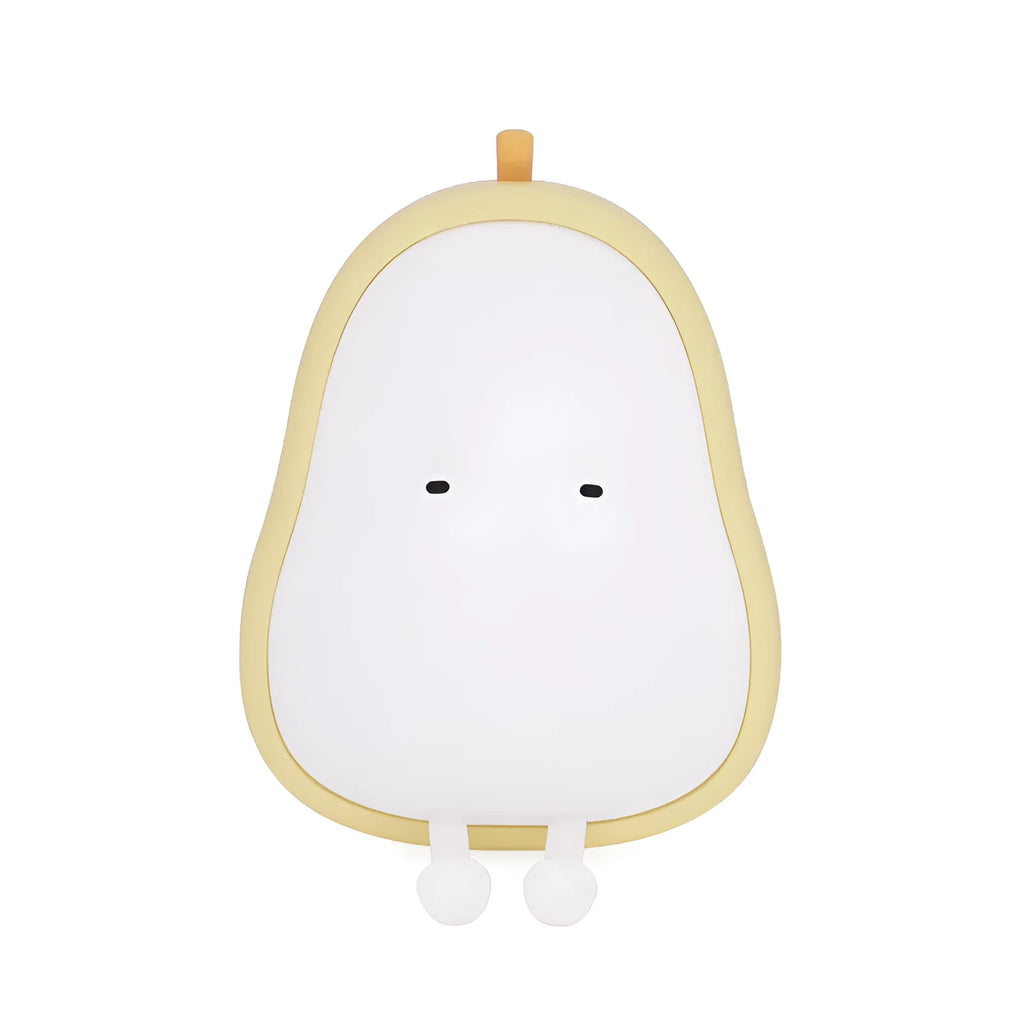 White silicone pear-shaped bedside night light emitting a warm yellow glow on a wooden table.