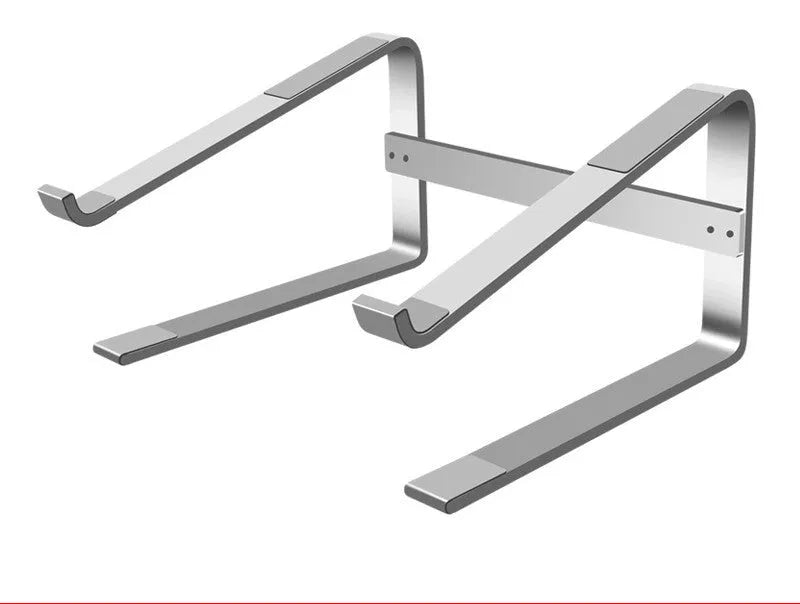 Silver aluminium alloy laptop riser bracket on a desk, showing its open frame design and 150mm height.