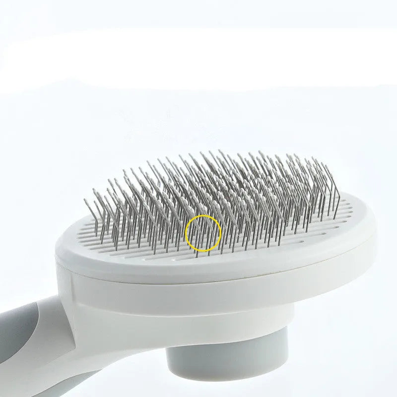 Self-cleaning pet comb with round handle and stainless steel sticky bead teeth in blue