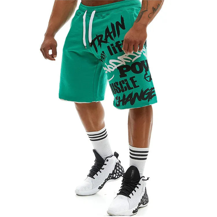 Men's cotton-spandex tactical five-point pants in green, black, and white with elastic high waist and loose straight-leg fit for summer.