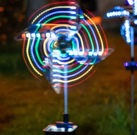 Solar wind spinner garden light with spinning pinwheel and LED illumination for outdoor path decoration