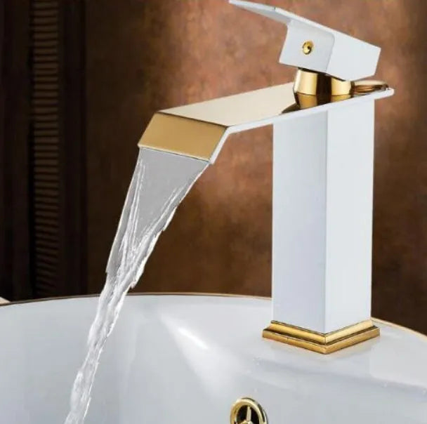 Black and white gold finished brass waterfall basin faucet with electric induction sensor.