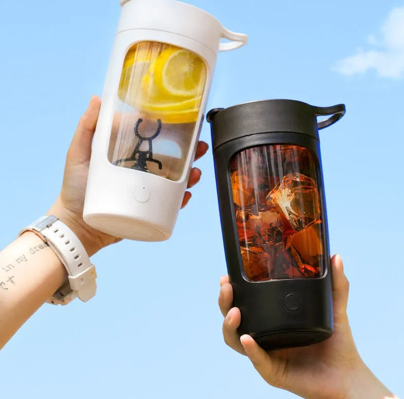 Portable automatic blender cup in four colour options showing compact design with integrated drinking vessel