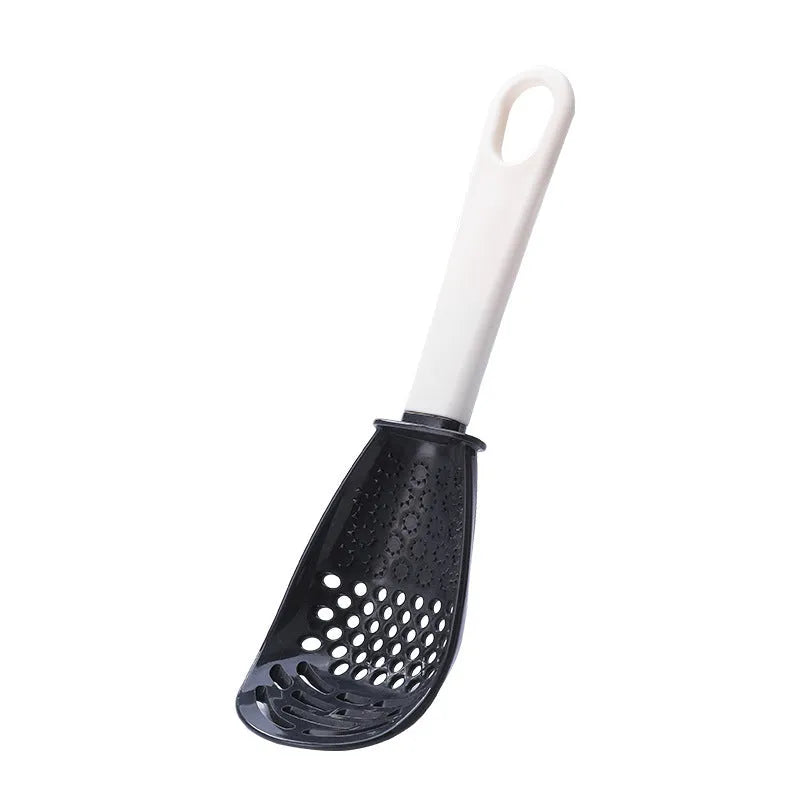 Red and black plastic multifunctional slotted cooking spoon with serrated edges for mashing and grinding.