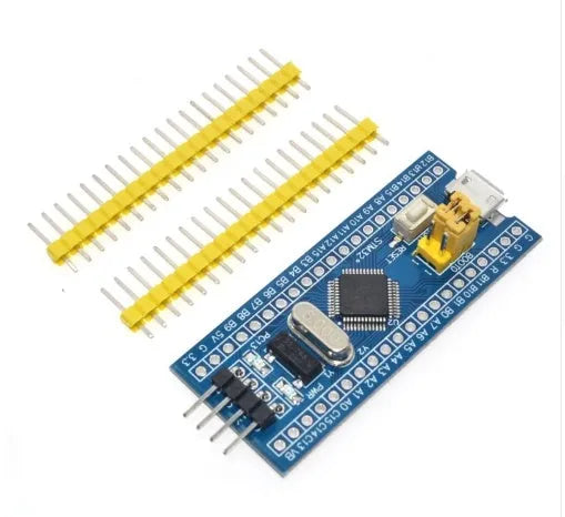 STM32F103C8T6 ARM Cortex-M3 development board showing microcontroller, Mini USB port, and connection headers