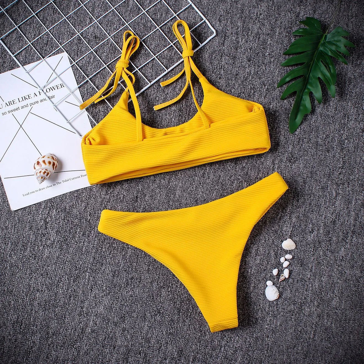 Women's strapless low waist bikini set in blue made from chlorinated fibre and nylon blend, front view