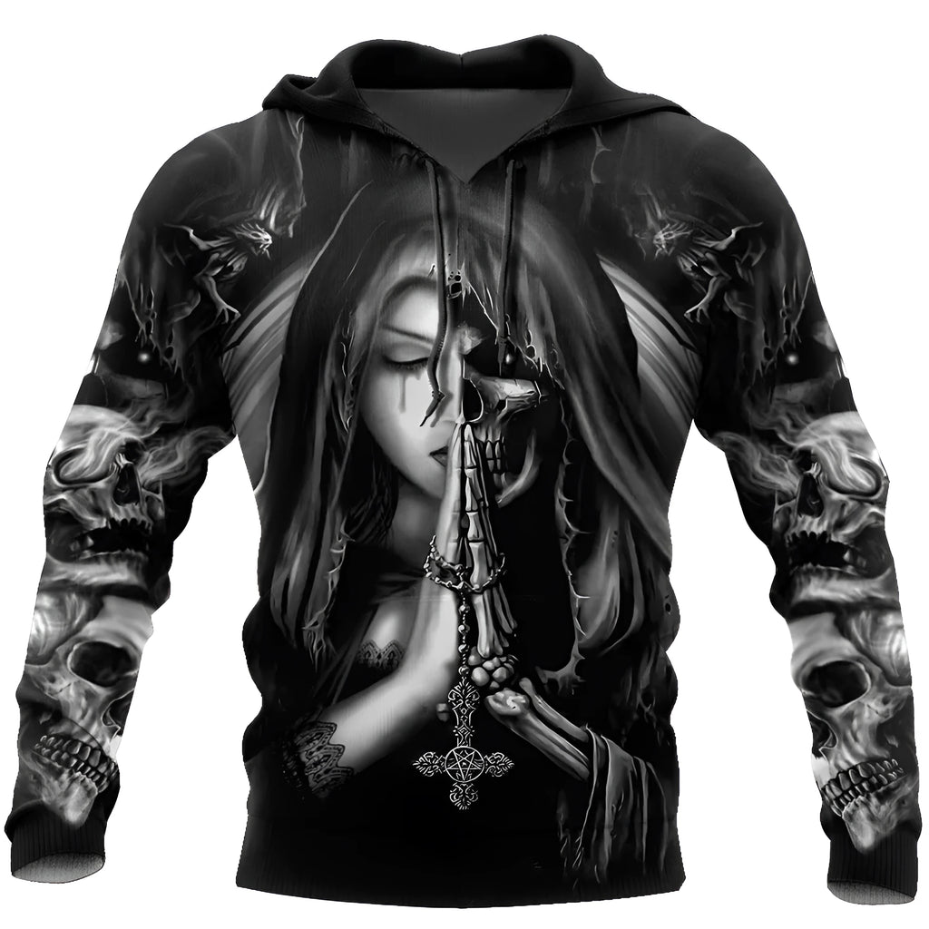 Adult wearing a black hooded sweatshirt with a large, textured 3D anime-style skull graphic on the front.