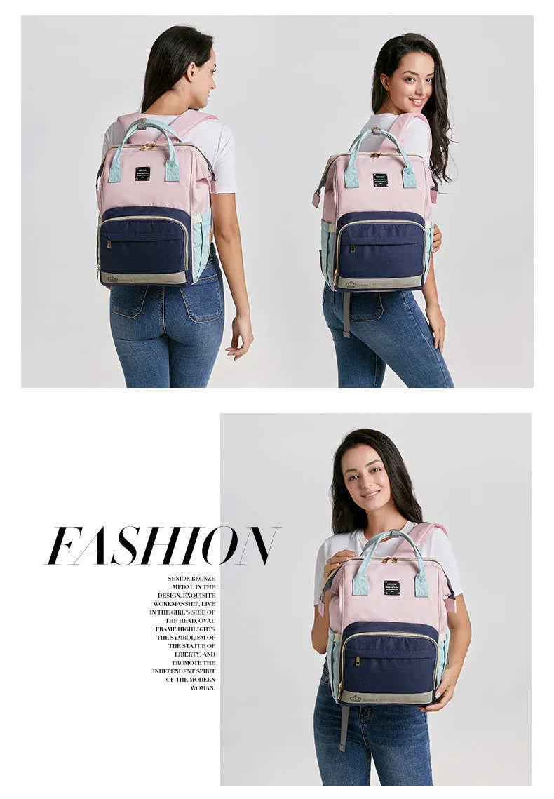 Mummy maternity bag backpack in solid colour with zipper closure and nylon finish