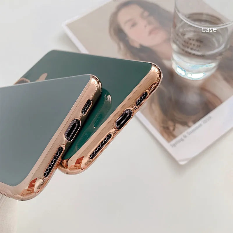 Luxury plating love solid colour TPU back cover case for iPhone on a table.