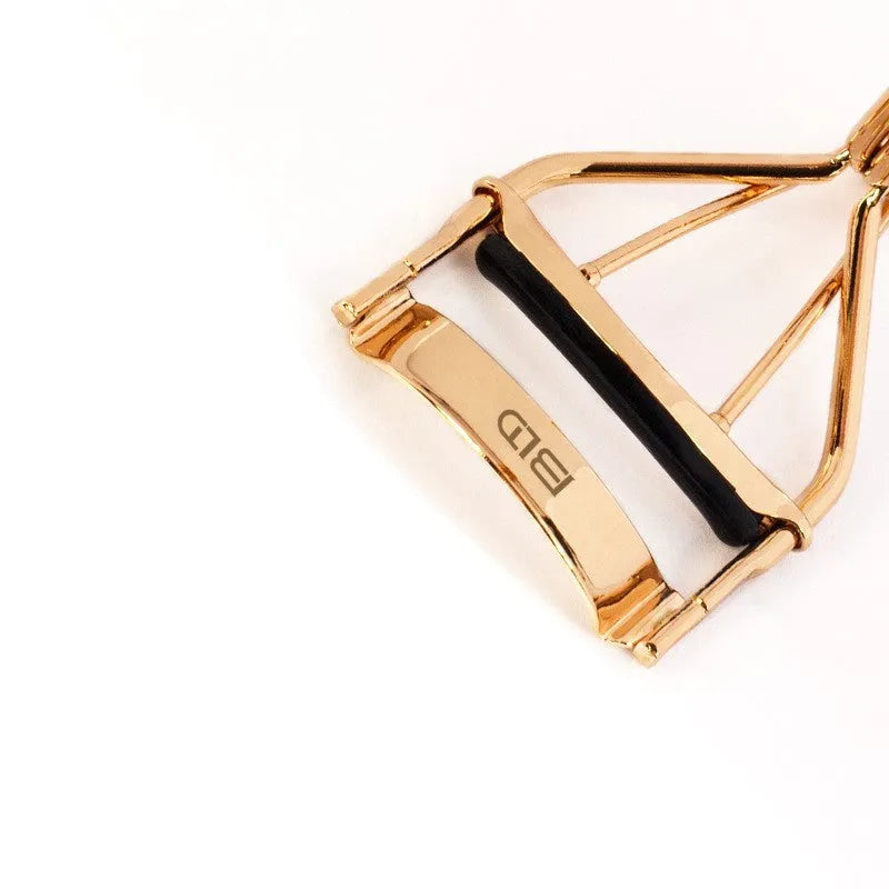 Beland Eyelash Curler G2 golden finish facial beauty tool on a white background