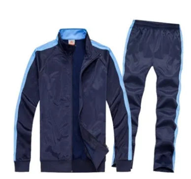 Children's football training suit in polyester, front view showing top and trousers, available in multiple colours and sizes from 3XS to 4XL
