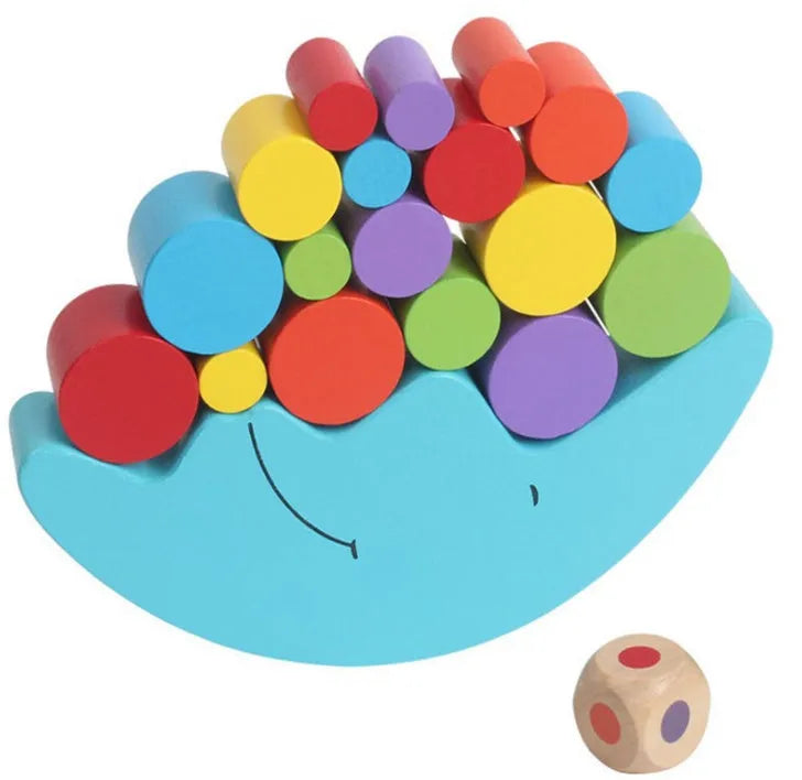 Yellow and blue moon-themed wooden balance game toy for toddlers on a white background.