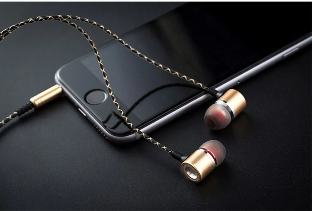 Fanbiya S1 metal in-ear earphones with ear hooks and in-line microphone control on a 1.2m cable.
