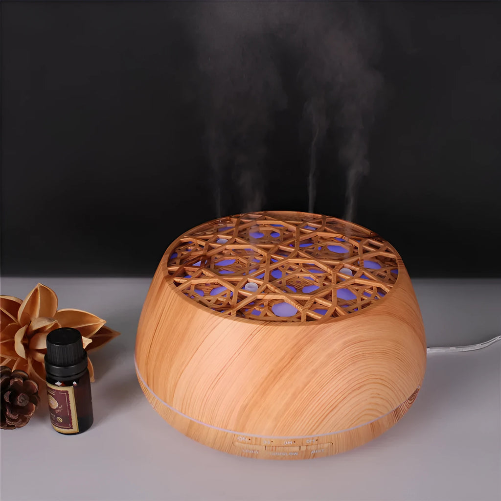 Four-hole misting ultrasonic aroma diffuser in dark wood grain finish with 400ml capacity and control buttons