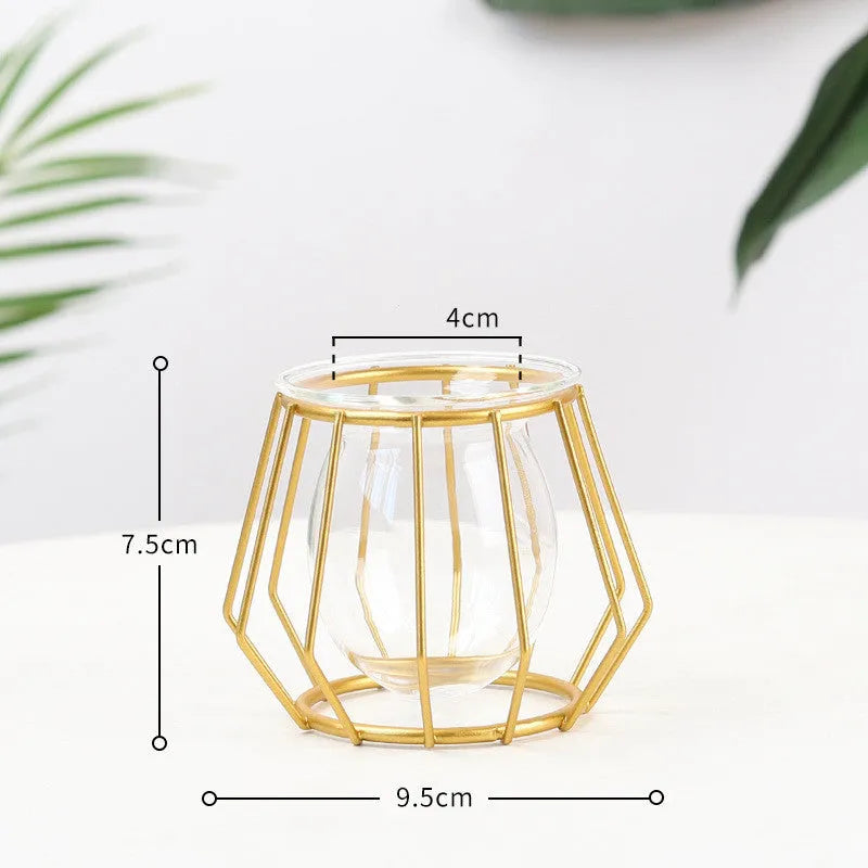 Nordic glass and iron desktop decoration in diamond gold shape on a wooden surface