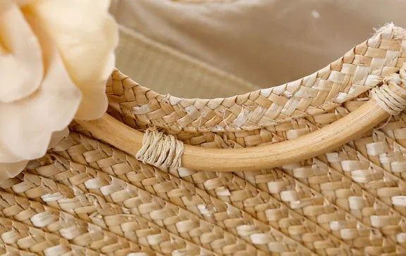 Natural primary colour woven straw bag beach bag handbag with shoulder straps on white background