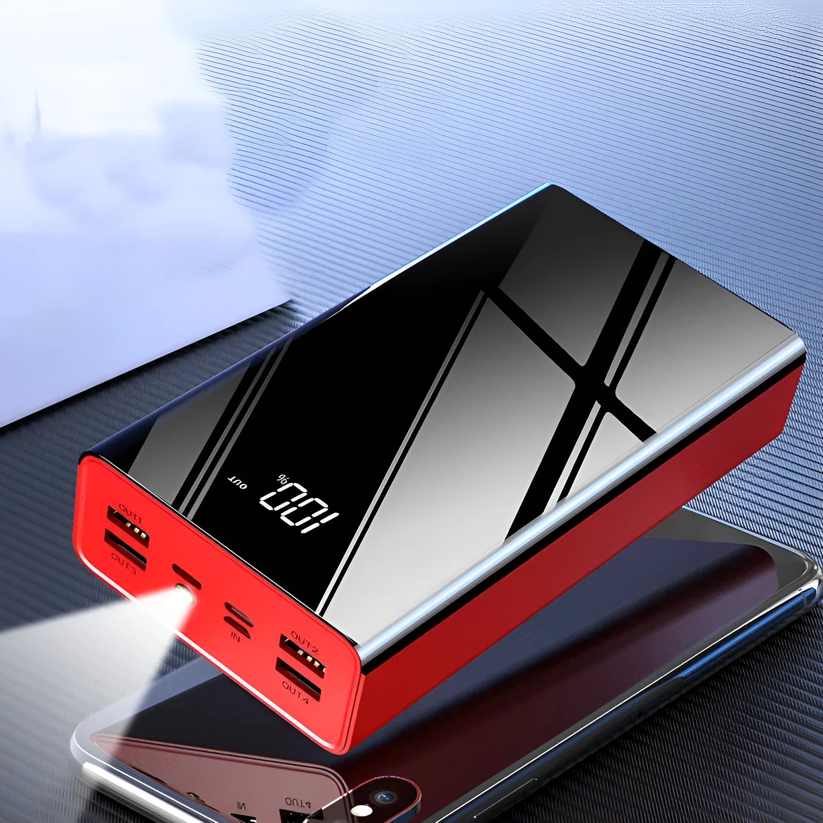 Black and red large 40000mAh power bank with LCD display screen showing battery percentage.