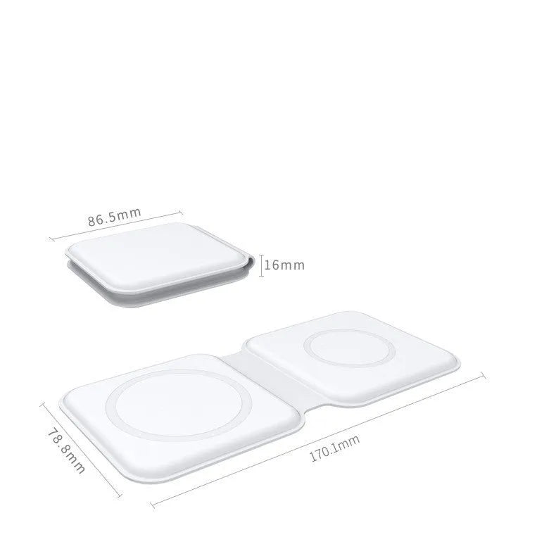 White foldable magnetic wireless charging dock with a phone attached and earbud case on the base.