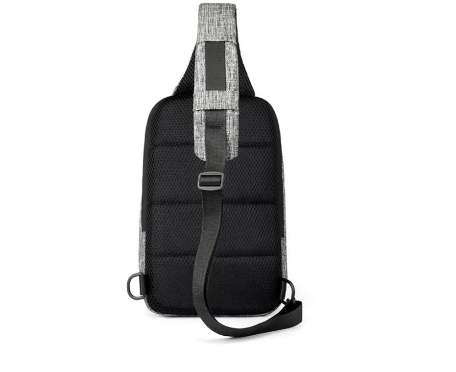 Dark blue Oxford cloth chest bag with a zip and adjustable strap, shown with a phone in its dedicated internal pocket.