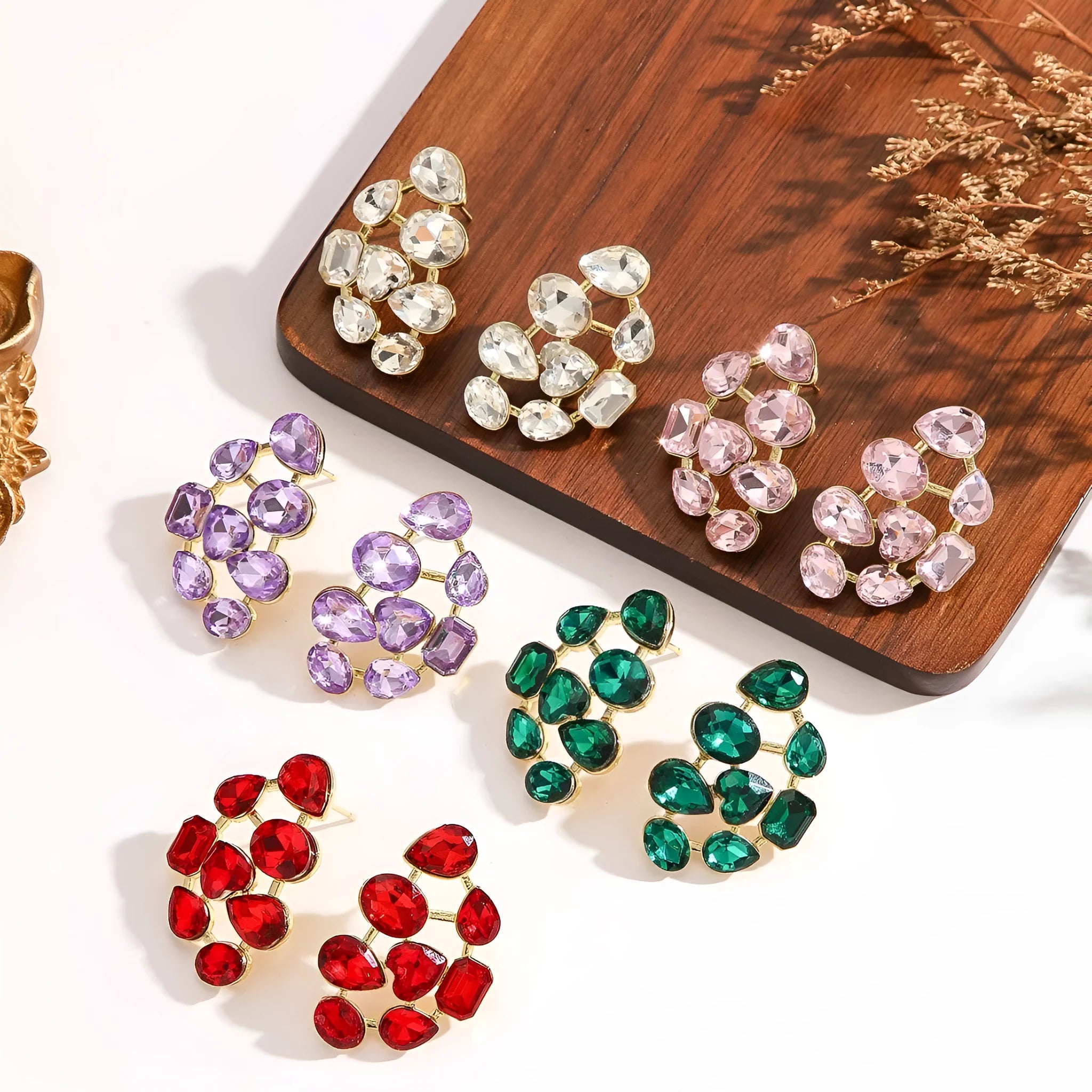 Hot selling fashionable alloy diamond studded earrings in a range of colours including green, pink, purple, red, and white