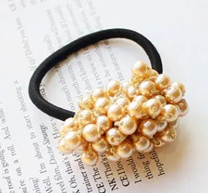 Cloth beaded hair rope in black colour on a white background