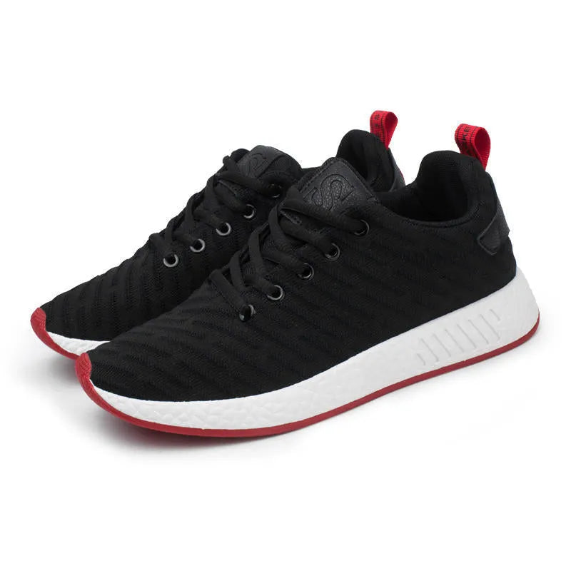 Men's Malcom low-top sneaker with mesh fabric upper and MD sole in black, grey, and white
