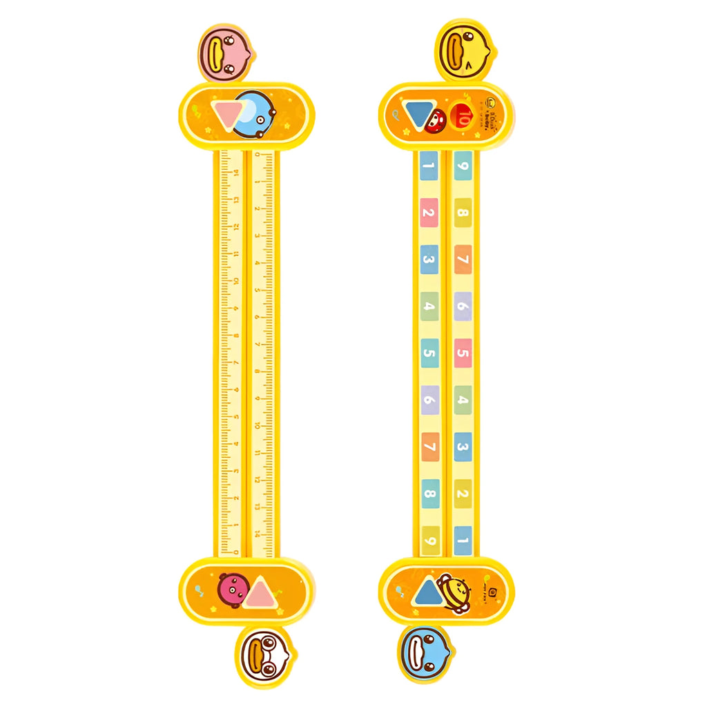 Yellow plastic children's digital resolution ruler with cartoon graphics measuring 24.5 cm long