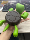 Turtle-shaped ABS plastic coaster in light green colour for heat insulation