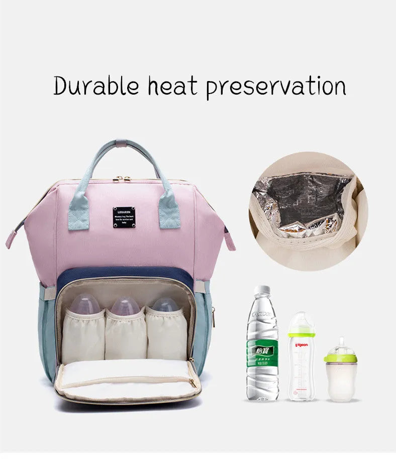 Mummy maternity bag backpack in solid colour with zipper closure and nylon finish