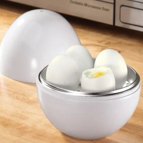 White microwave egg cooker for 4 eggs with adjustable timer knob and vent holes