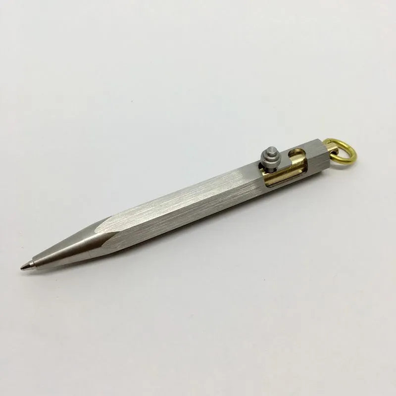 Six-sided stainless steel brass push pen with keychain attachment shown in assorted colours