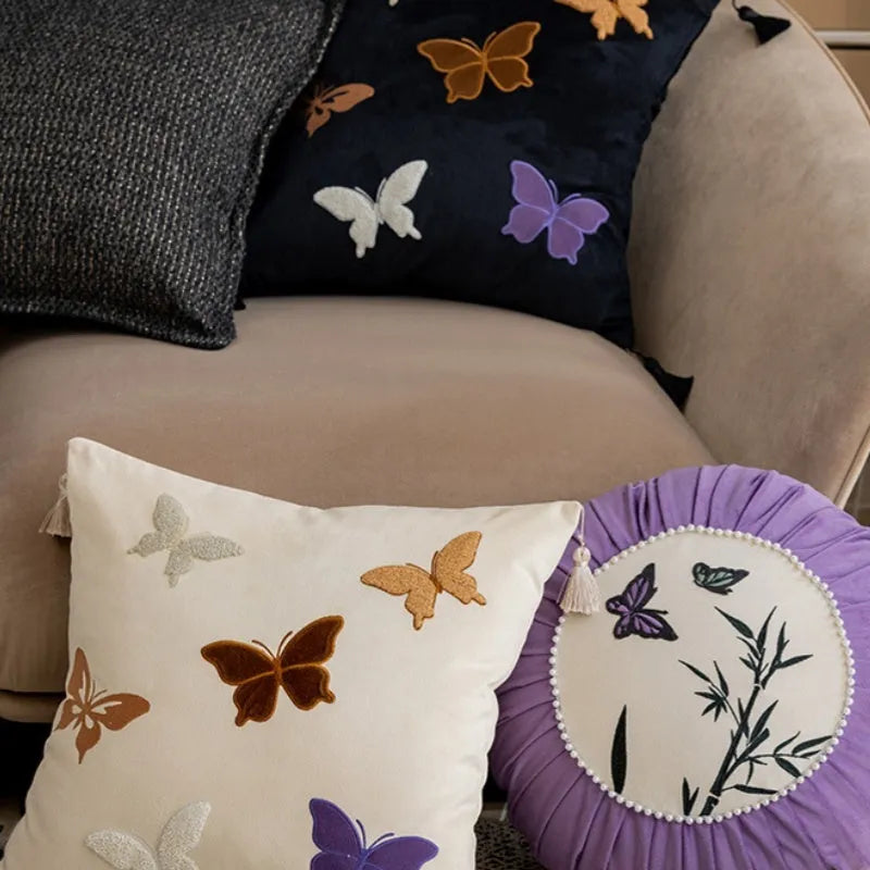 Square beige cushion with detailed Chinese style butterfly embroidery, 45x45cm.