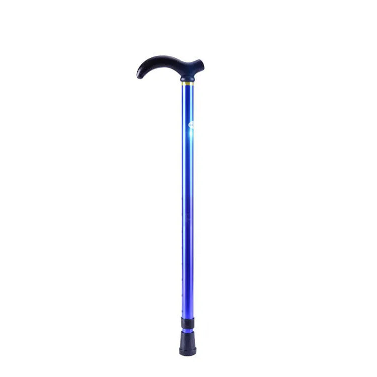 Telescopic aluminium walking stick with rubber tip on outdoor trail, six-grade adjustment knob visible on shaft