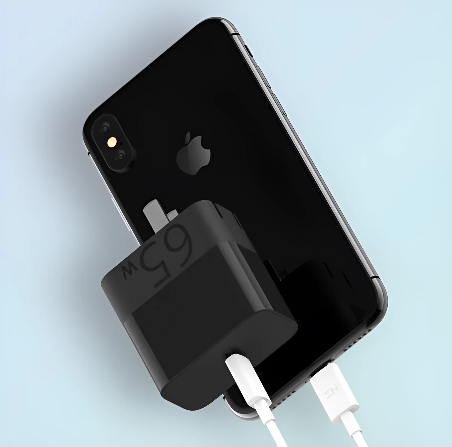 Black 65W USB-C laptop power adapter showing compact design with single USB-C output port