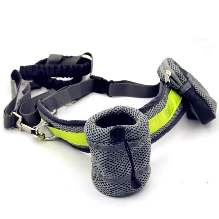 Adjustable hands free dog leash set with gray nylon retractable rope and waist bag on a grass field